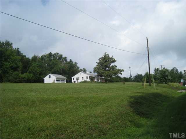 1827 Jimmie Kerr Road, Unit 2 Graham, NC 27253 - Photo 2 of 6 Right side of lot from road