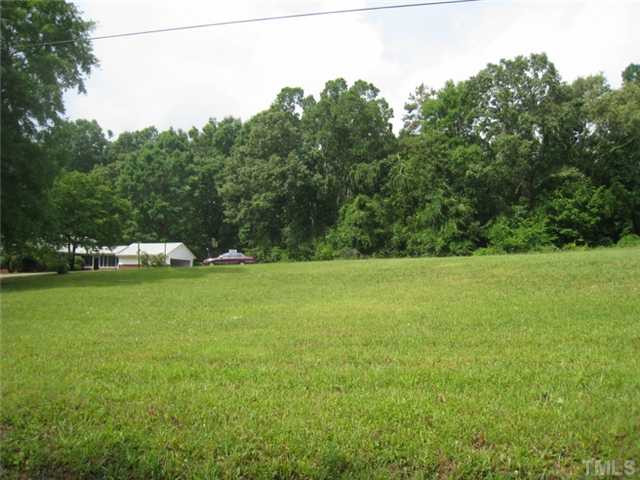 1827 Jimmie Kerr Road, Unit 2 Graham, NC 27253 - Photo 4 of 6 Left side of lot from road