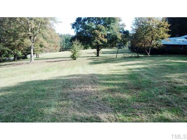 1827 Jimmie Kerr Road, Unit 2 Graham, NC 27253 - Photo 5 of 6 Left side of Lot