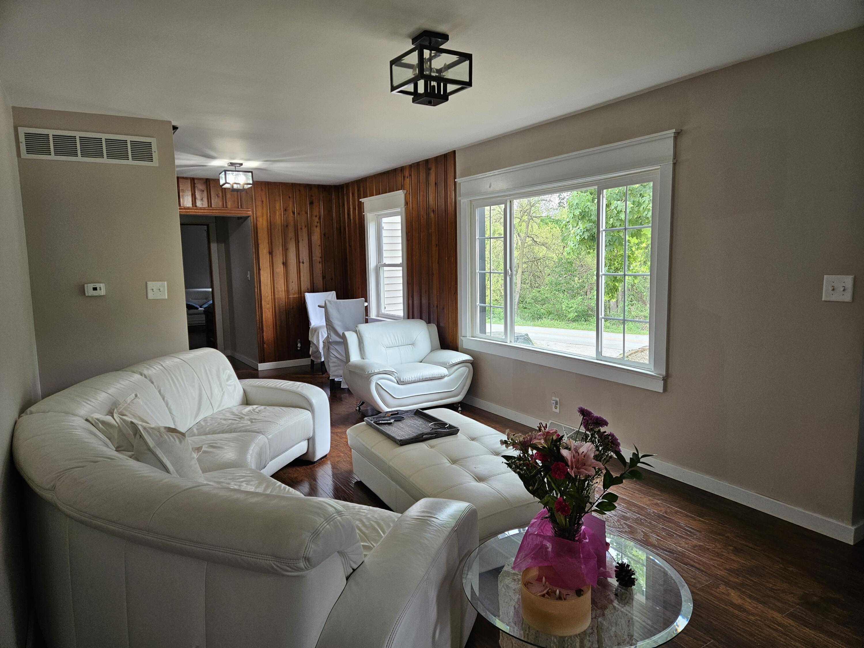 16335 County Line Road Hebron, IN 46341 - Photo 11 of 29 a living room with furniture and a window