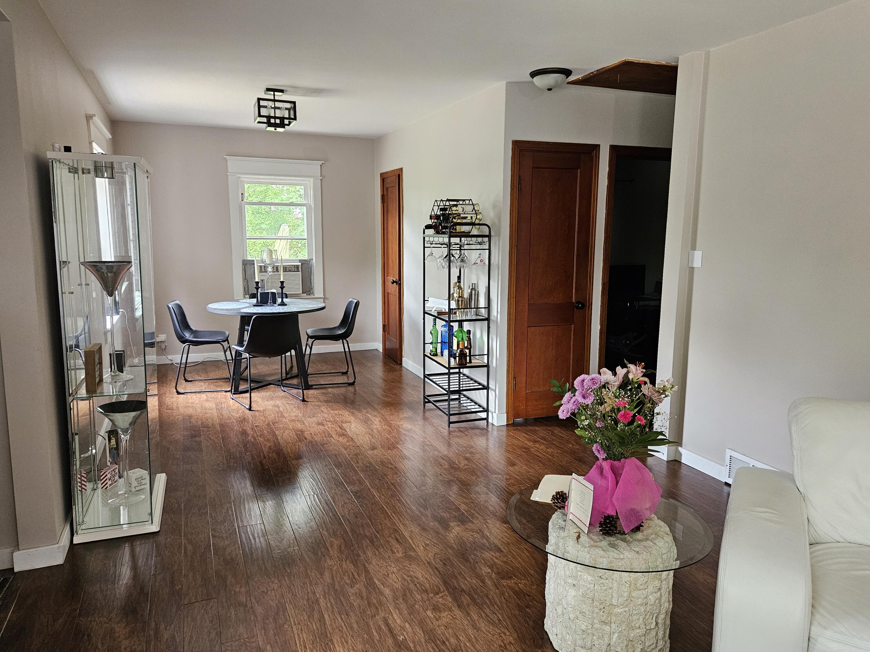 16335 County Line Road Hebron, IN 46341 - Photo 12 of 29 a living room with furniture and flowers
