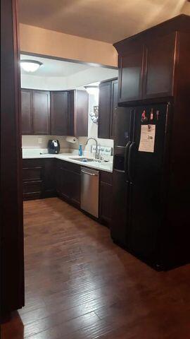 16335 County Line Road Hebron, IN 46341 - Photo 13 of 29 a large kitchen with granite countertop a stove and cabinets
