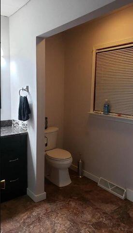 16335 County Line Road Hebron, IN 46341 - Photo 19 of 29 a bathroom with a toilet and a sink