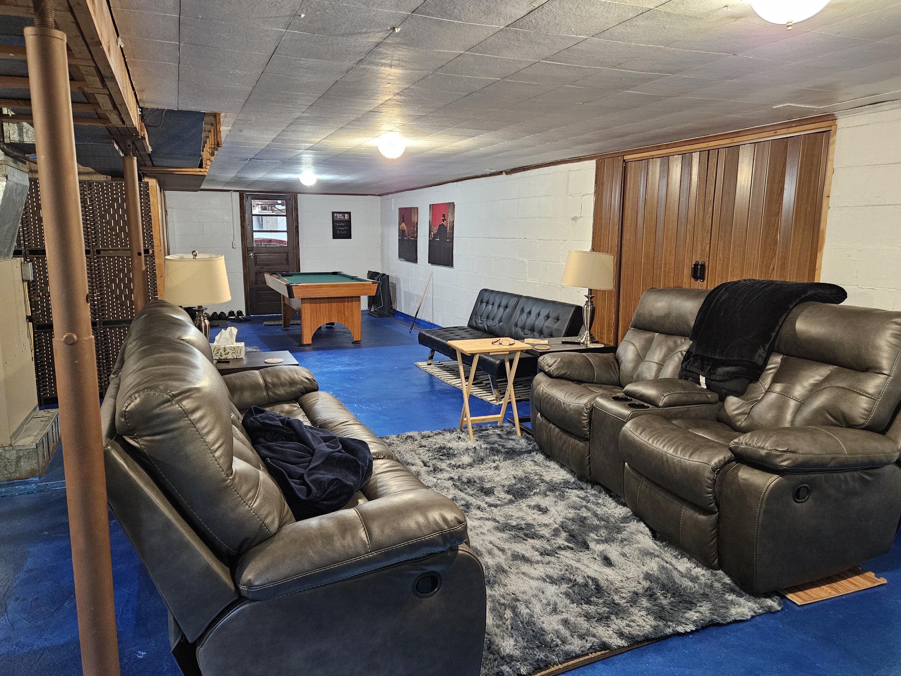 16335 County Line Road Hebron, IN 46341 - Photo 24 of 29 a living room with furniture and a window