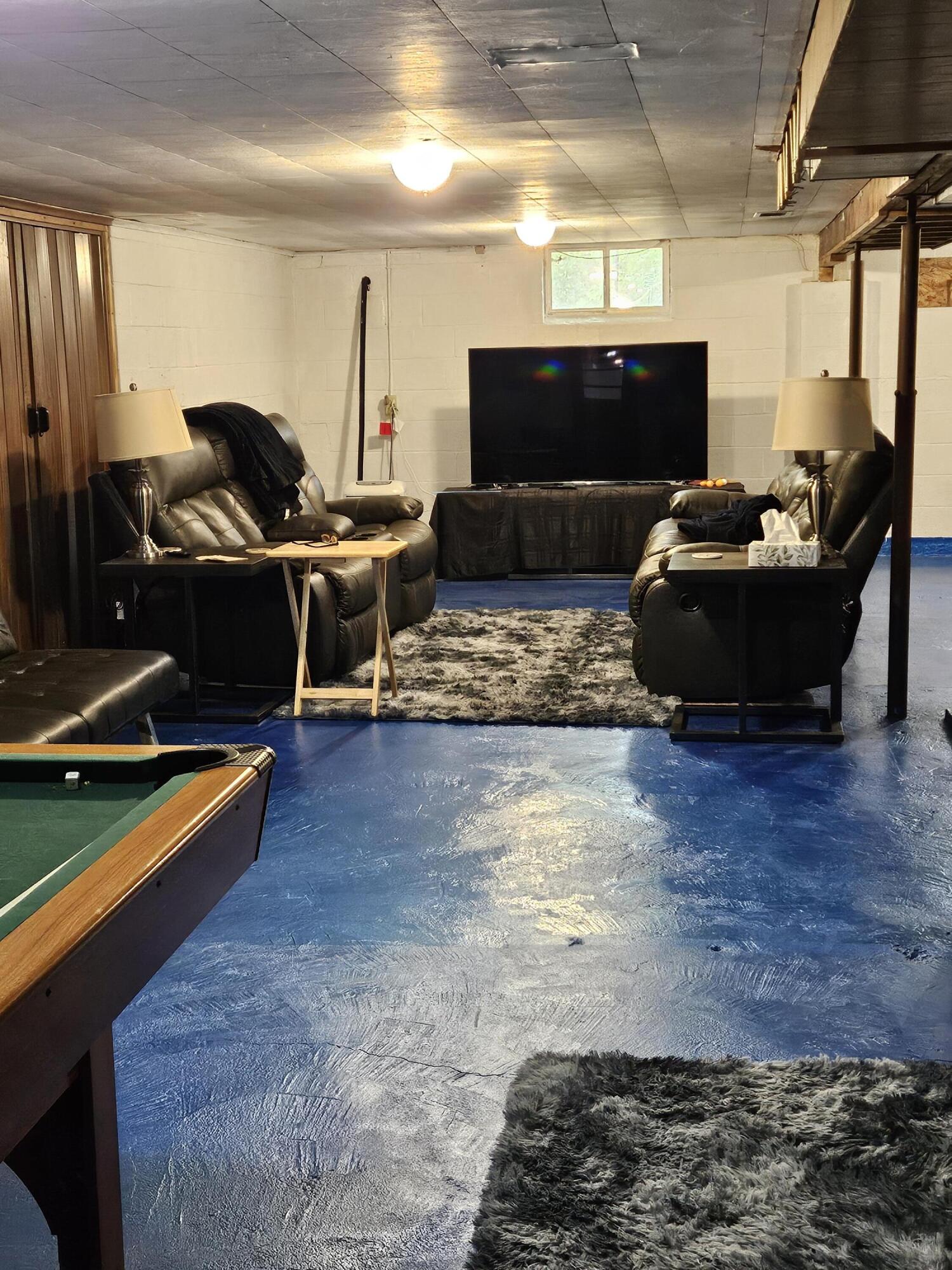 16335 County Line Road Hebron, IN 46341 - Photo 26 of 29 a living room with furniture and a flat screen tv