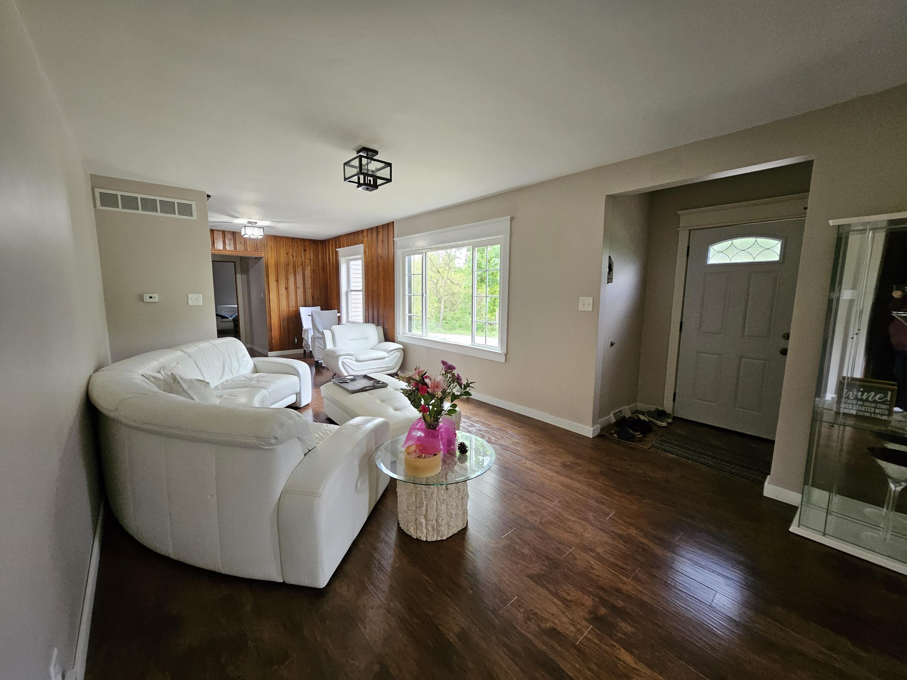 16335 County Line Road Hebron, IN 46341 - Photo 10 of 29 a living room with furniture and a flat screen tv