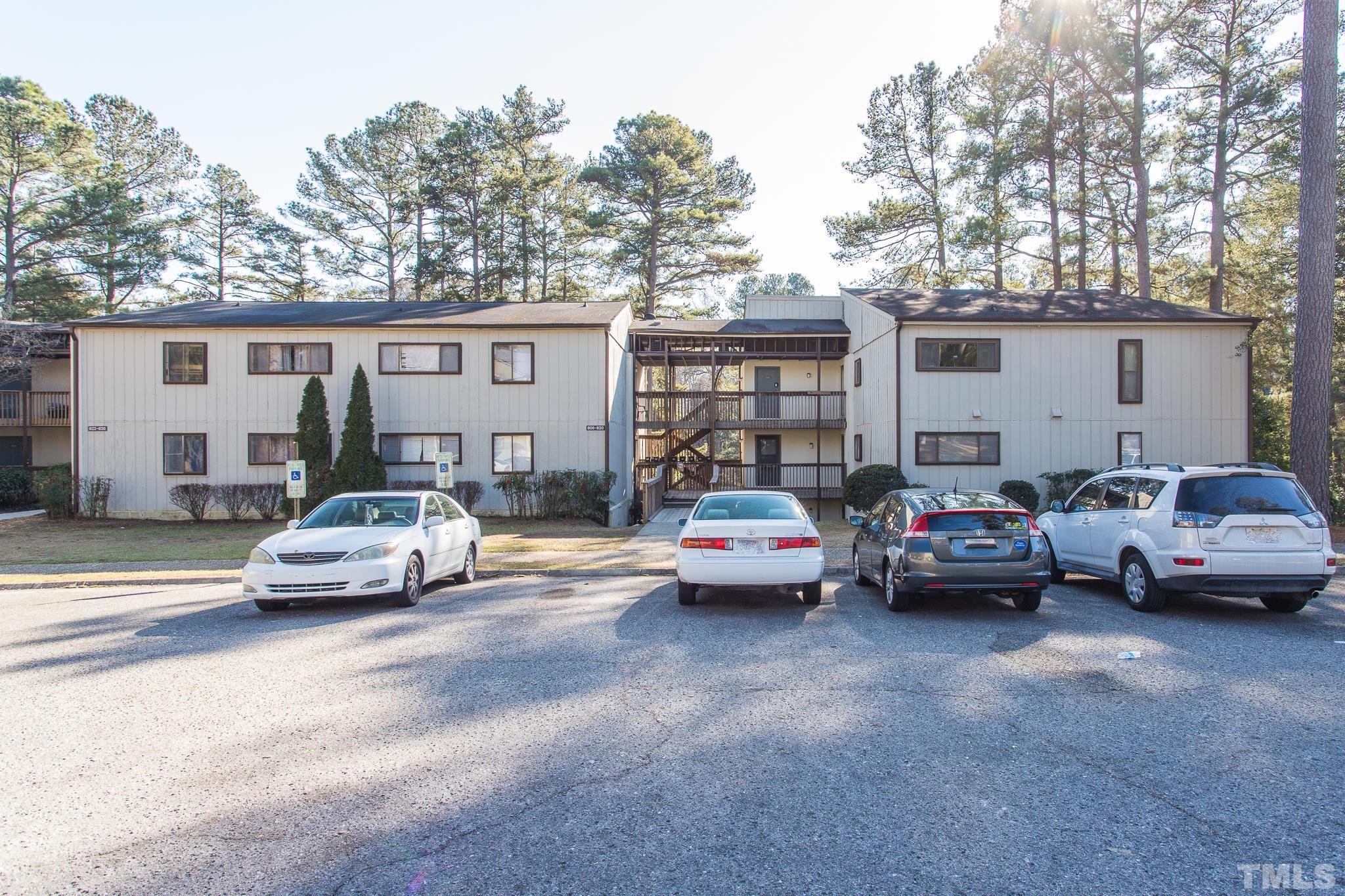 608 Pine Ridge Place, Unit NONE Raleigh, NC 27609 - Photo 1 of 16 a view of cars parked in front of a house