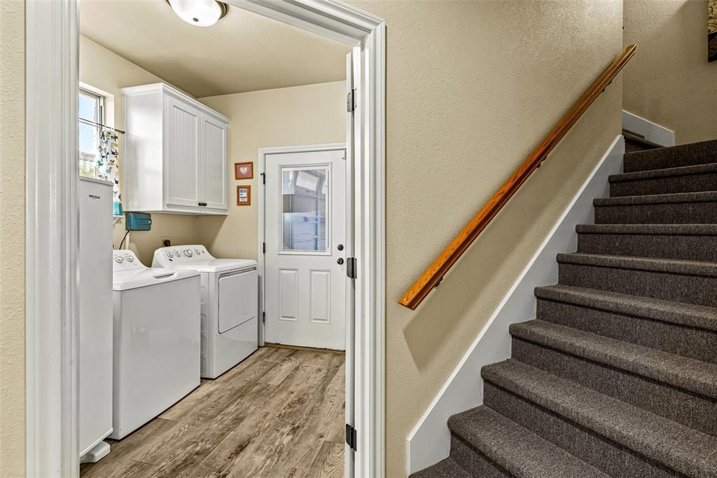 1177 Ronald Road Glen Rose, TX 76043 - Photo 13 of 30 a room with a washer and dryer