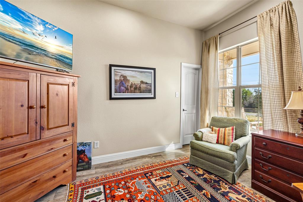 1177 Ronald Road Glen Rose, TX 76043 - Photo 9 of 30 a living room with furniture and next to a window