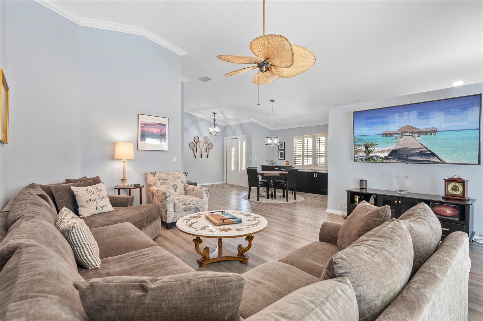 7904 Travelers Tree Drive Boca Raton, FL 33433 - Photo 17 of 35 a living room with furniture kitchen view and a large window