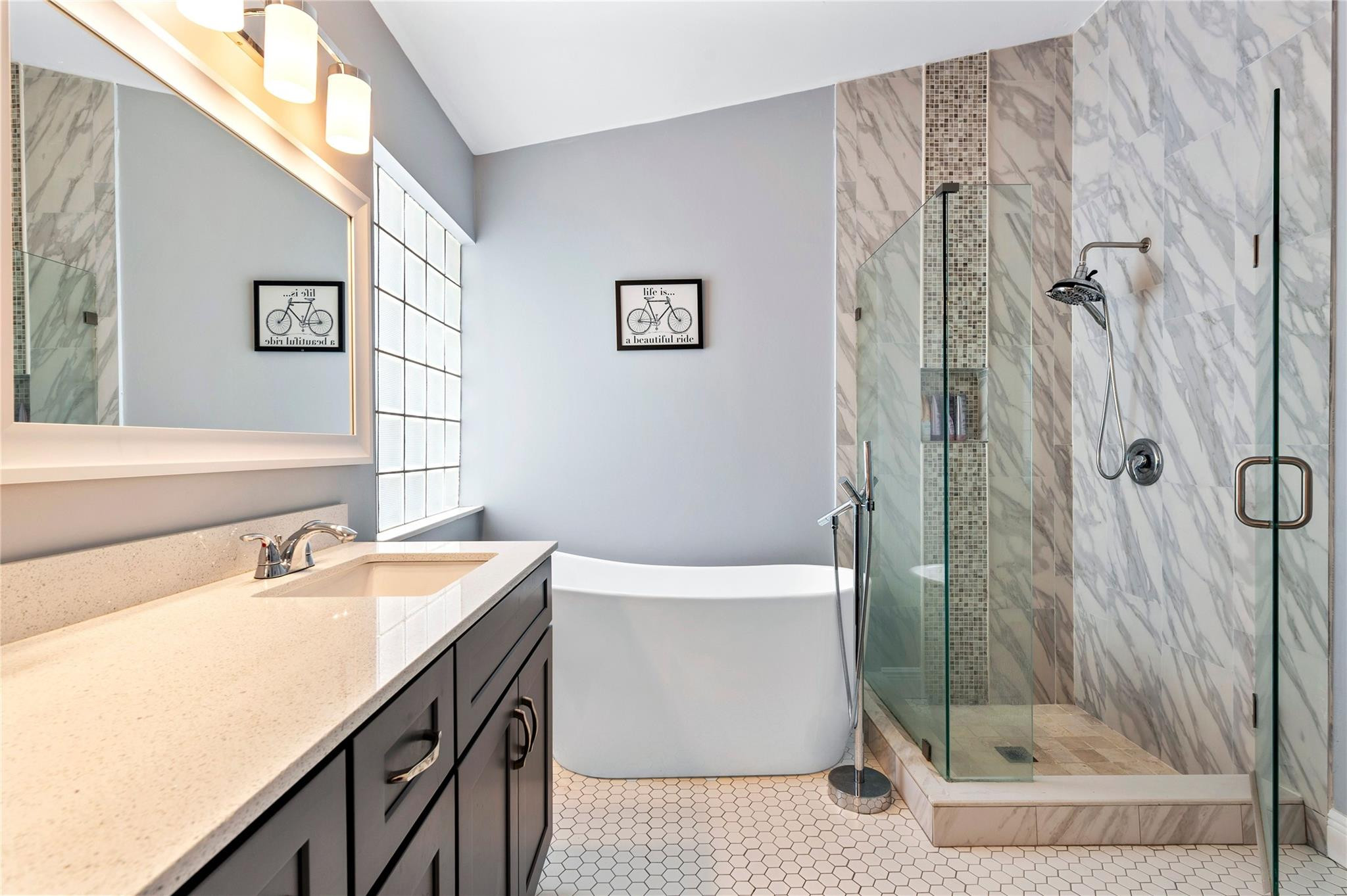 7904 Travelers Tree Drive Boca Raton, FL 33433 - Photo 22 of 35 a bathroom with a sink a toilet and shower