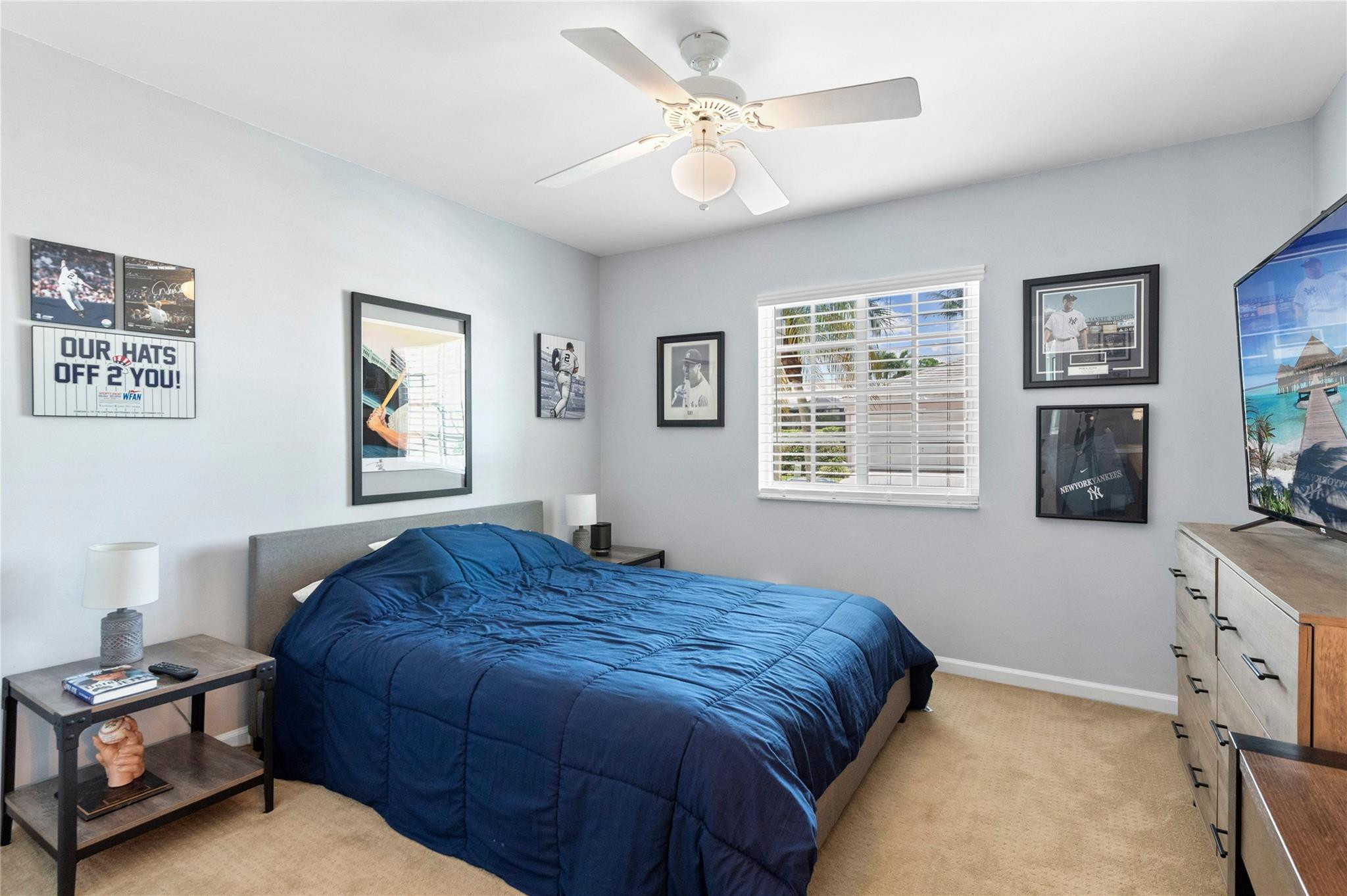 7904 Travelers Tree Drive Boca Raton, FL 33433 - Photo 24 of 35 a bedroom with a bed next to a window
