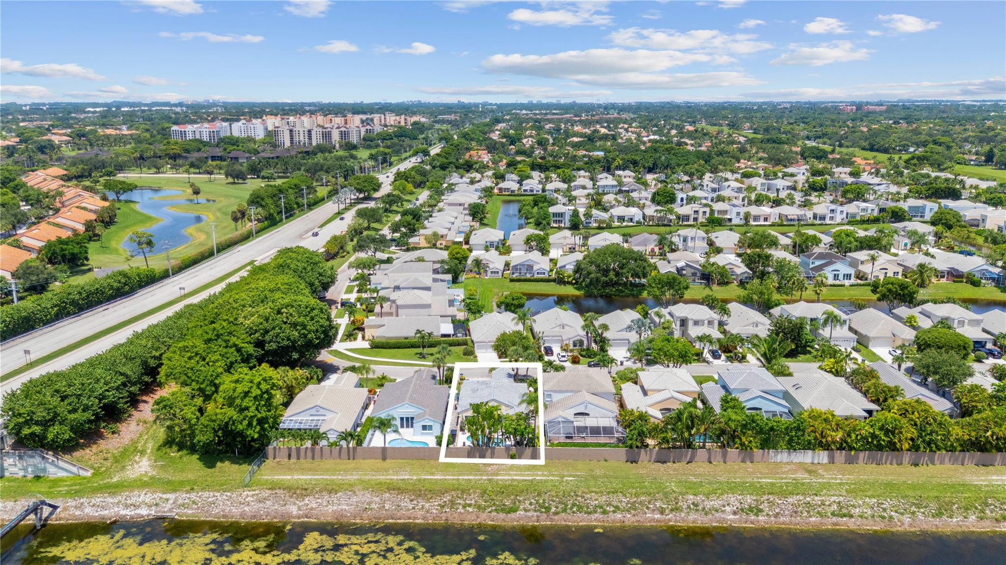7904 Travelers Tree Drive Boca Raton, FL 33433 - Photo 29 of 35 an aerial view of residential houses with outdoor space and river