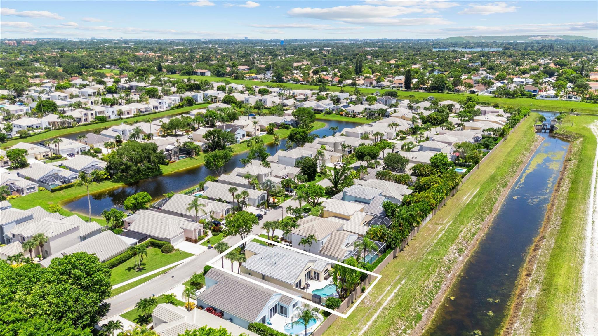 7904 Travelers Tree Drive Boca Raton, FL 33433 - Photo 30 of 35 an aerial view of residential houses with outdoor space