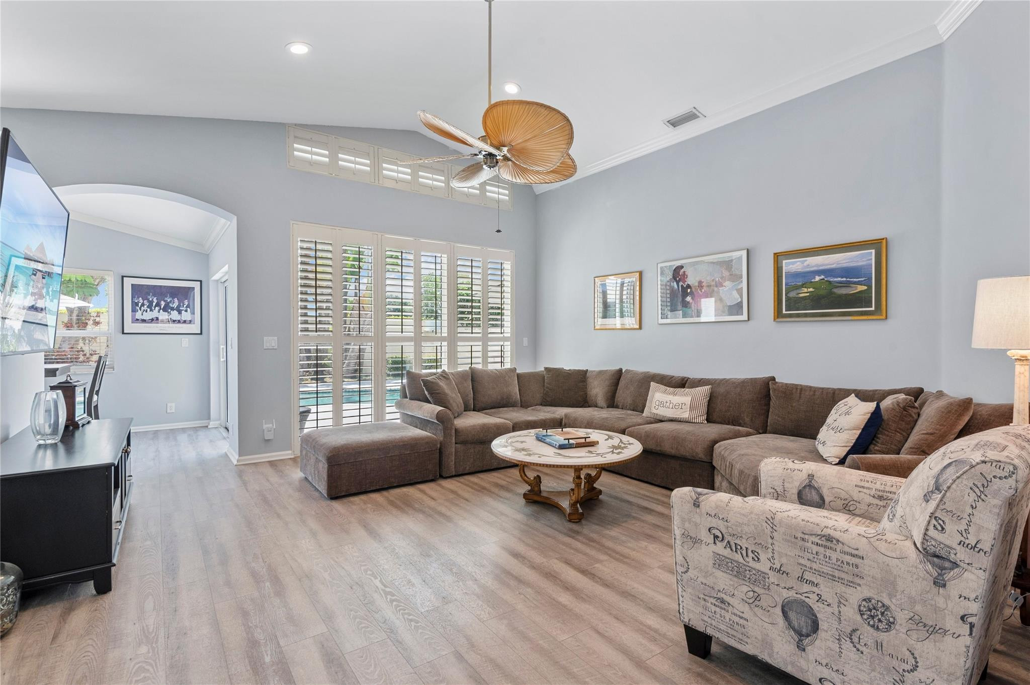 7904 Travelers Tree Drive Boca Raton, FL 33433 - Photo 7 of 35 a living room with furniture and a large window