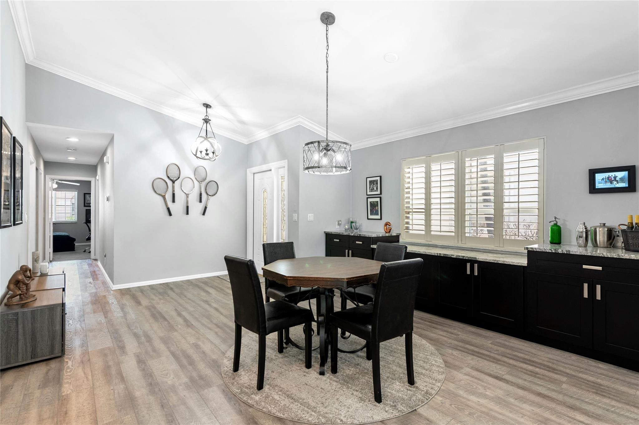 7904 Travelers Tree Drive Boca Raton, FL 33433 - Photo 8 of 35 a view of a dining room with furniture window and wooden floor