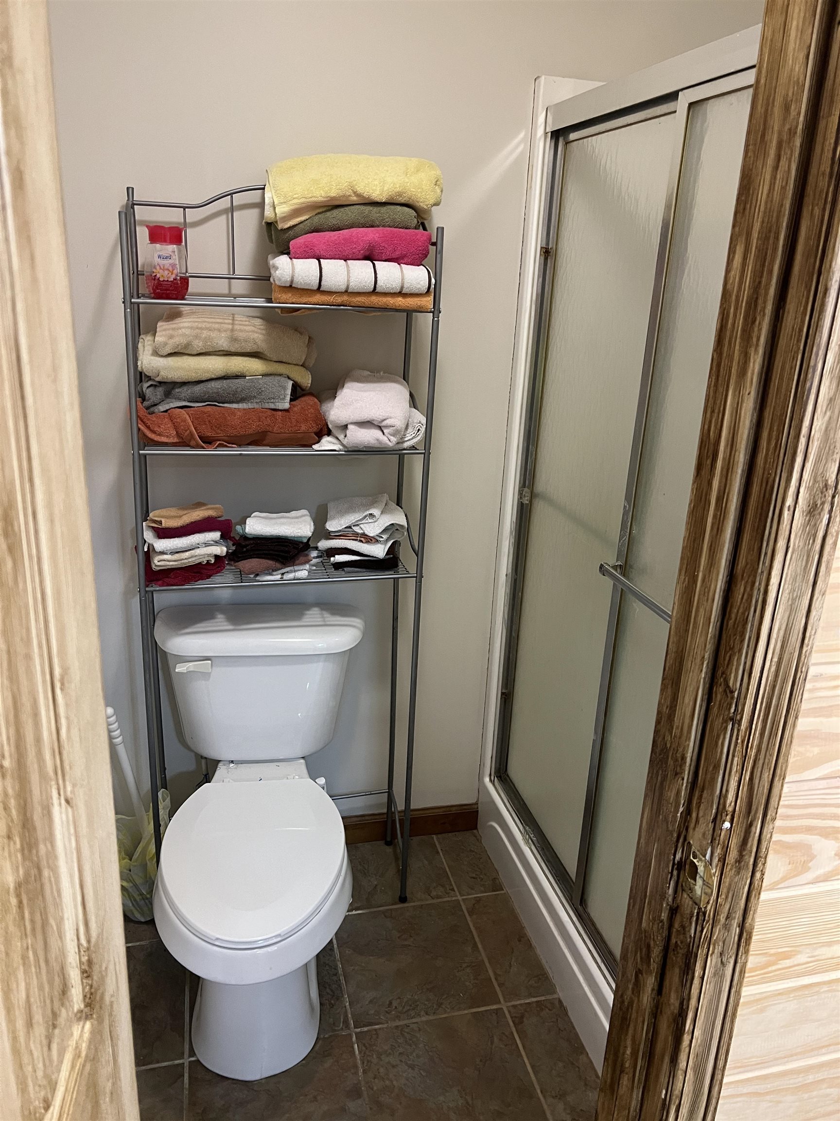 860 Plainview Road Henderson, TN 38340 - Photo 17 of 40 a bathroom with a toilet and a shower