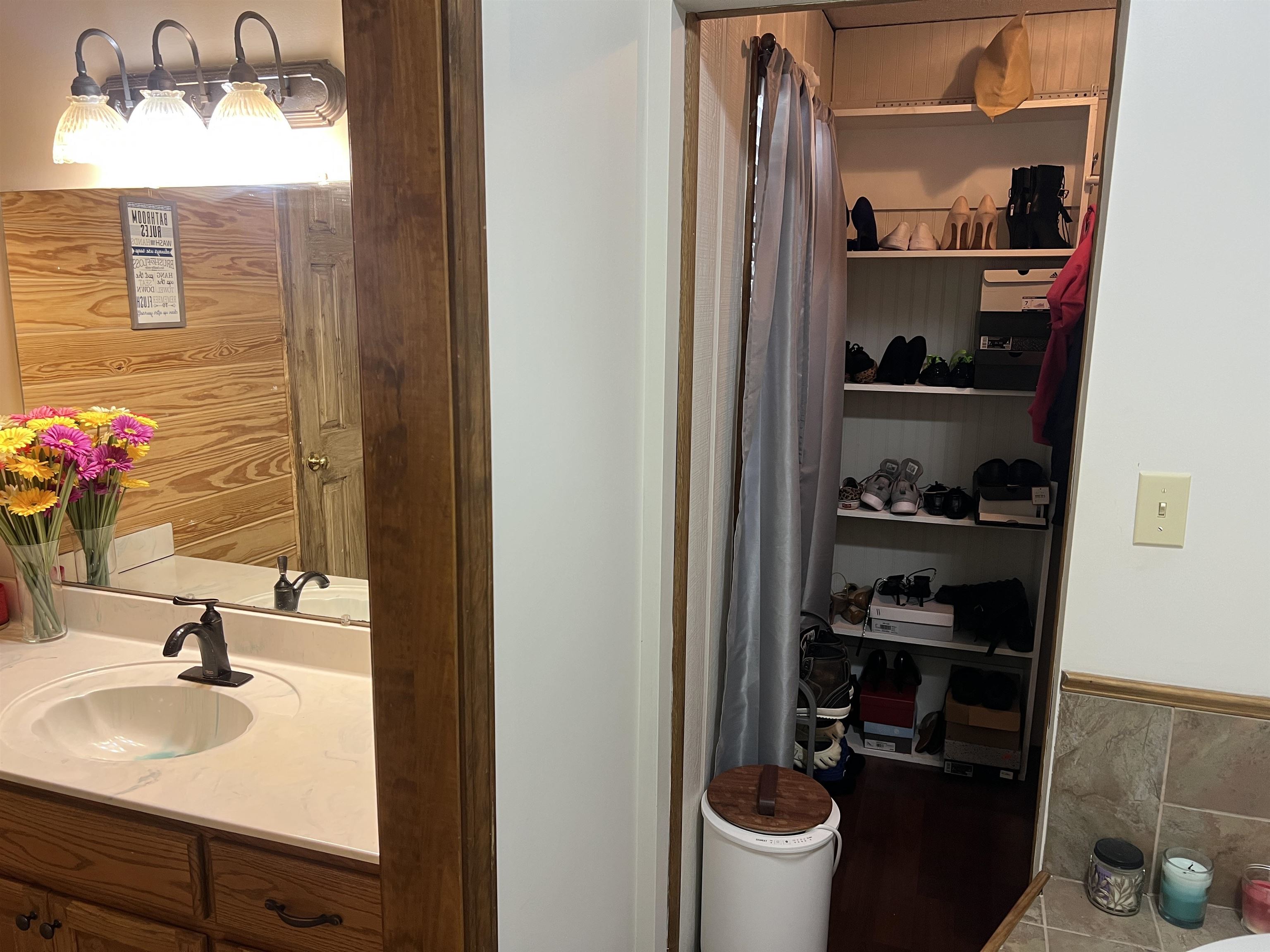 860 Plainview Road Henderson, TN 38340 - Photo 18 of 40 a bathroom with a sink and a mirror