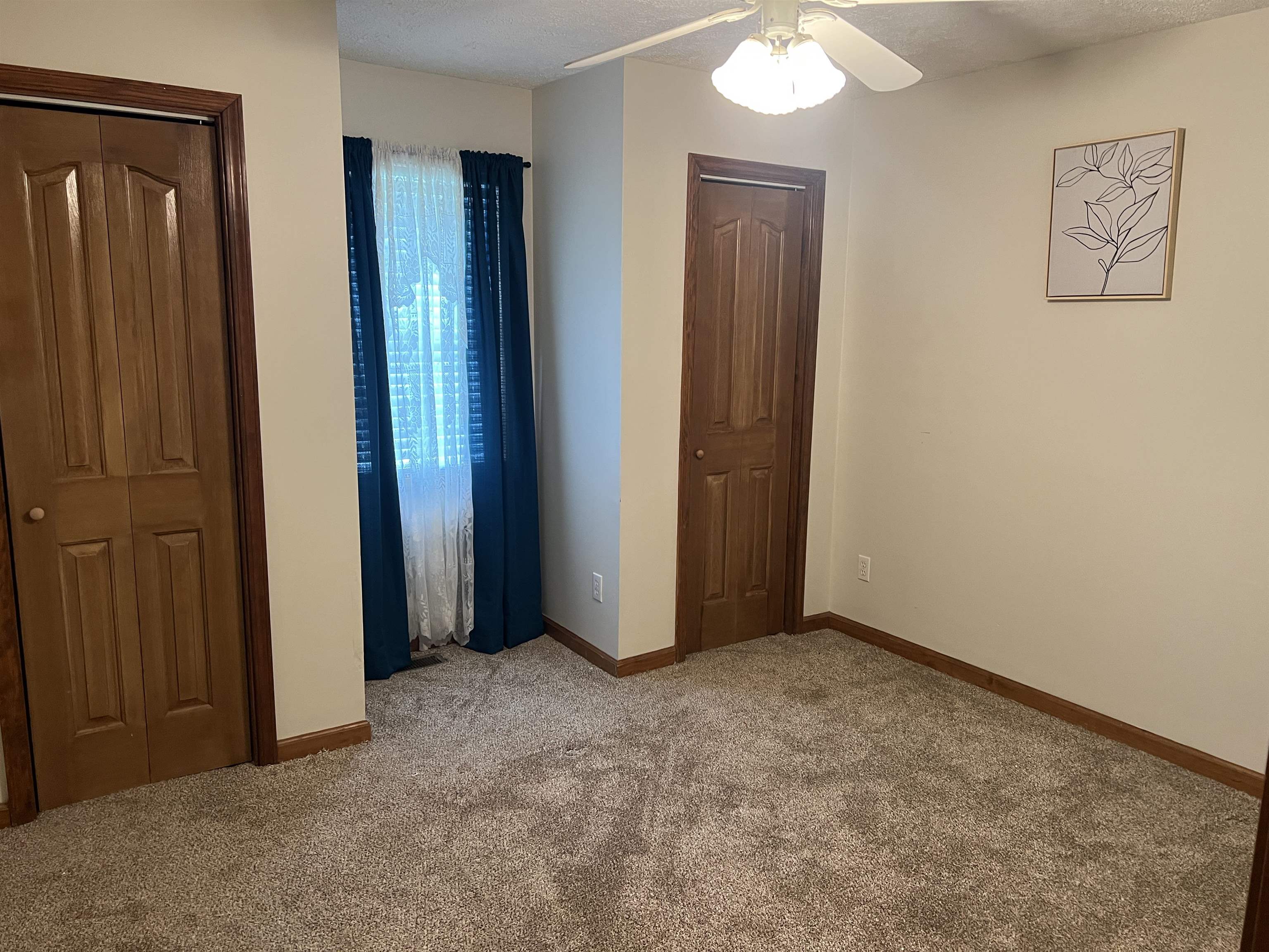 860 Plainview Road Henderson, TN 38340 - Photo 20 of 40 an empty room with closet and mirror