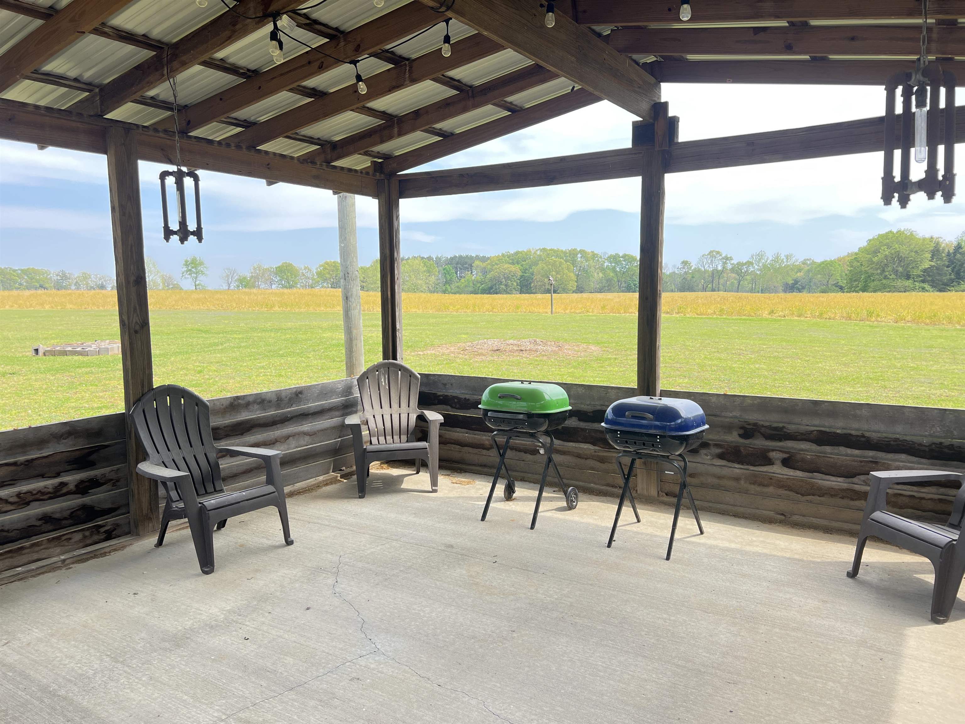 860 Plainview Road Henderson, TN 38340 - Photo 25 of 40 a living room with furniture and floor to ceiling windows