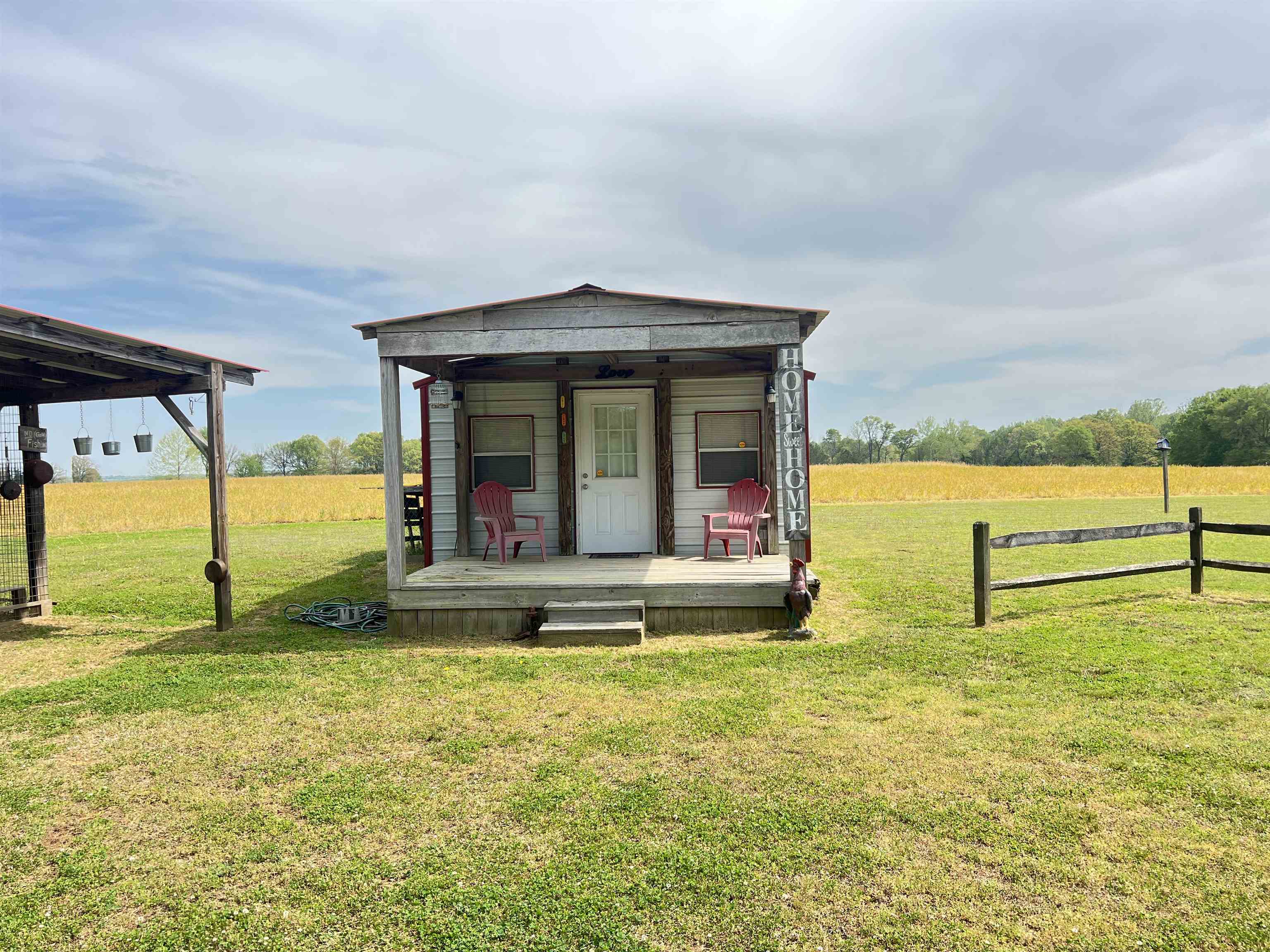 860 Plainview Road Henderson, TN 38340 - Photo 27 of 40 a view of an house with swimming pool