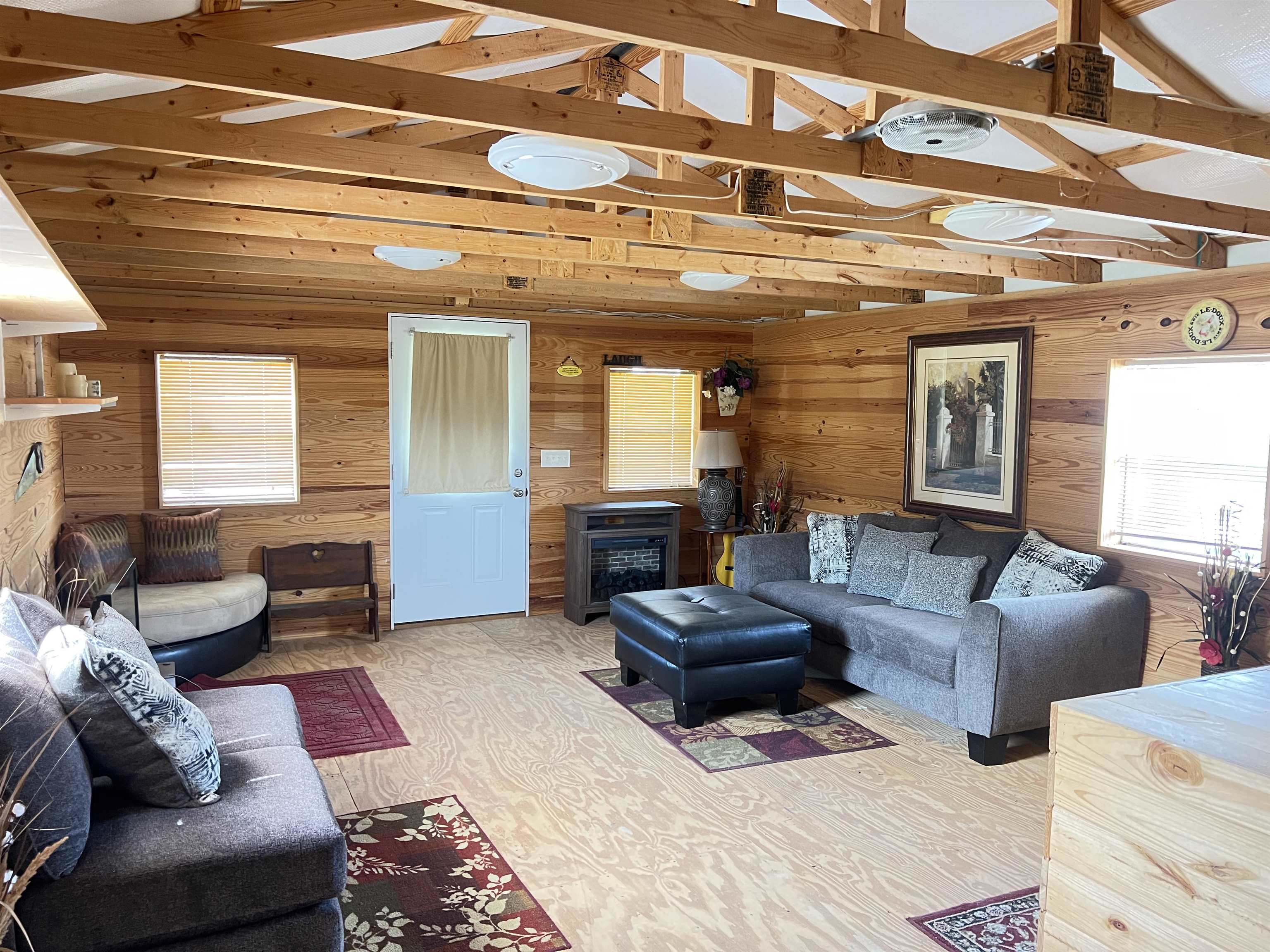 860 Plainview Road Henderson, TN 38340 - Photo 29 of 40 a living room with furniture and a large window