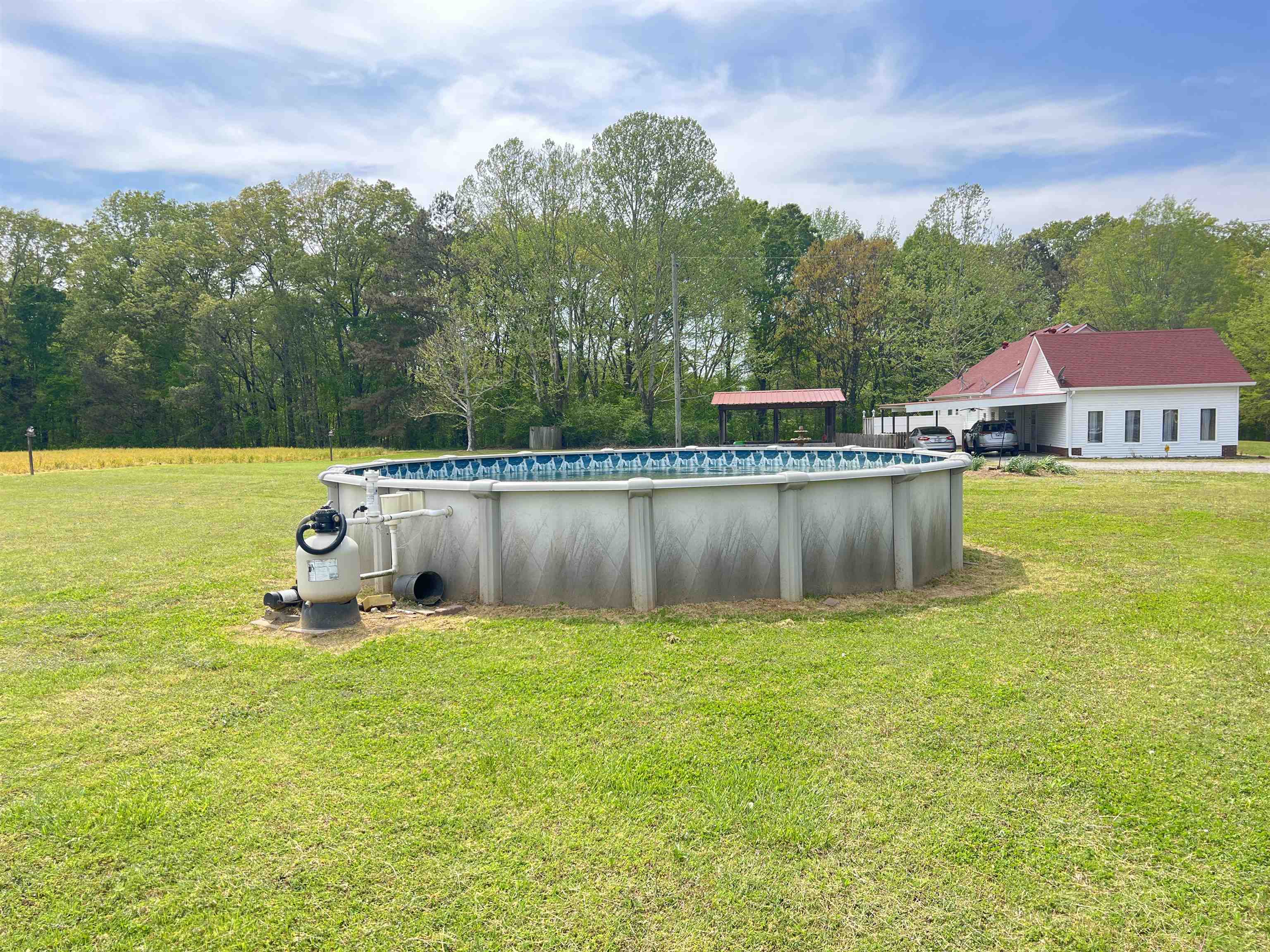 860 Plainview Road Henderson, TN 38340 - Photo 37 of 40 a view of a lake with a house in the background