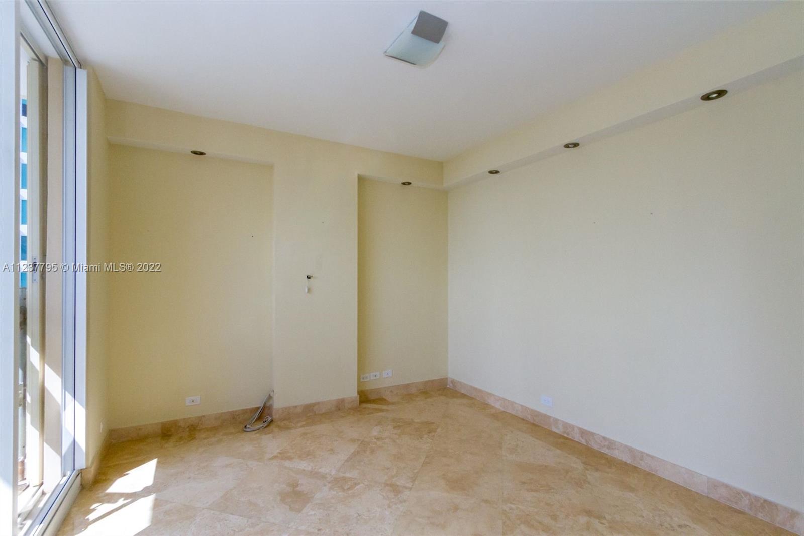 888 Brickell Key Drive, Unit PH2802 Miami, FL 33131 - Photo 14 of 47 a view of an empty room