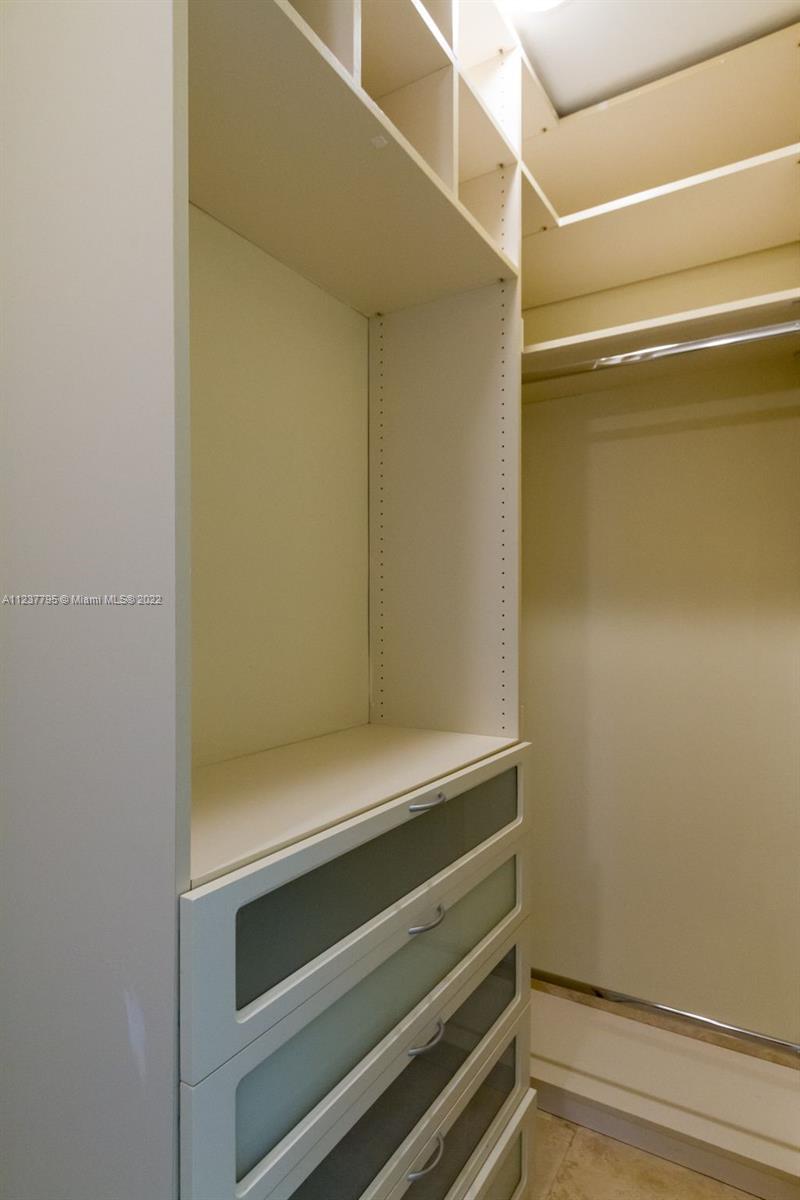888 Brickell Key Drive, Unit PH2802 Miami, FL 33131 - Photo 22 of 47 a close view of closet