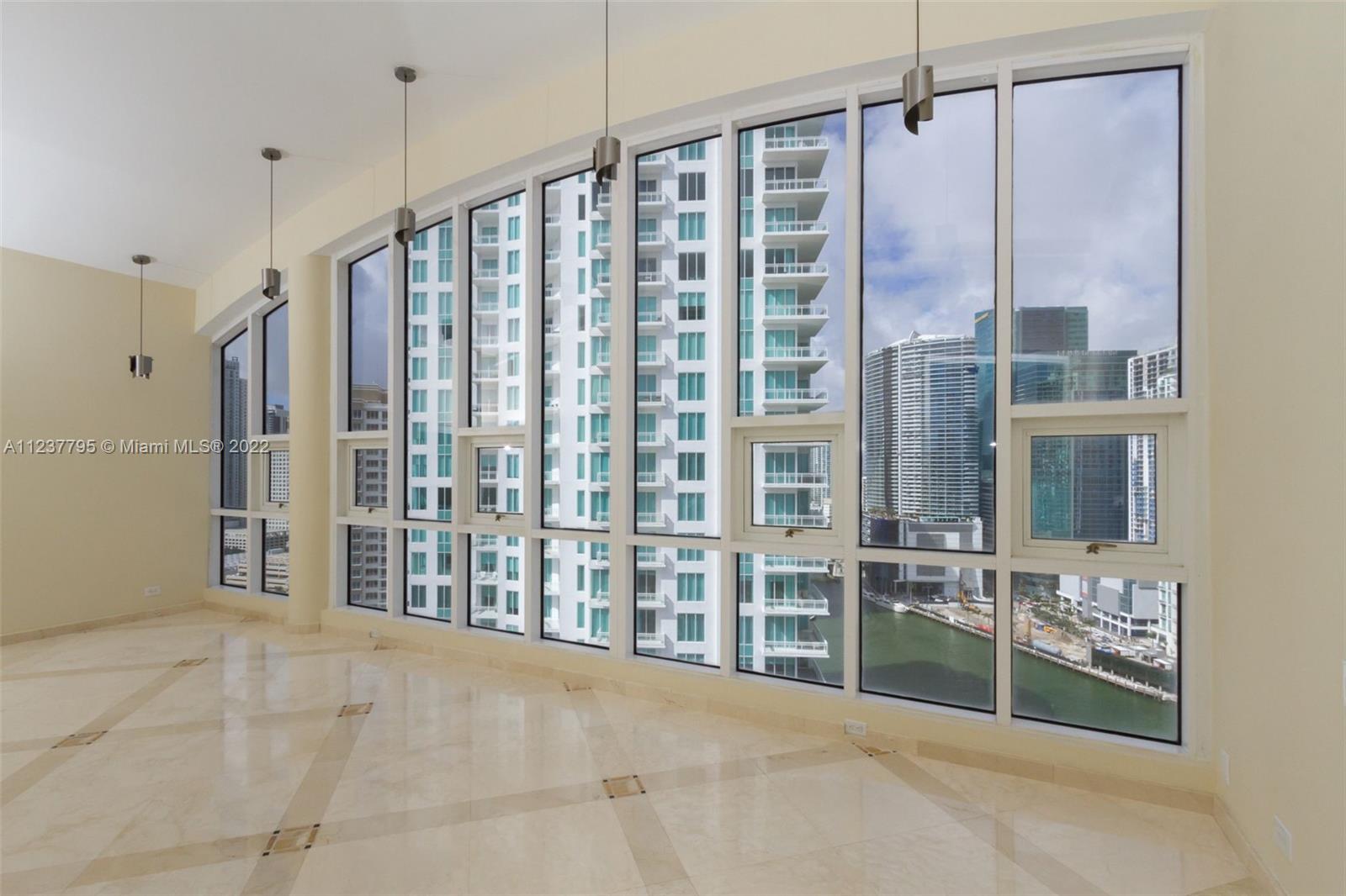 888 Brickell Key Drive, Unit PH2802 Miami, FL 33131 - Photo 29 of 47 a view of entryway with stairs