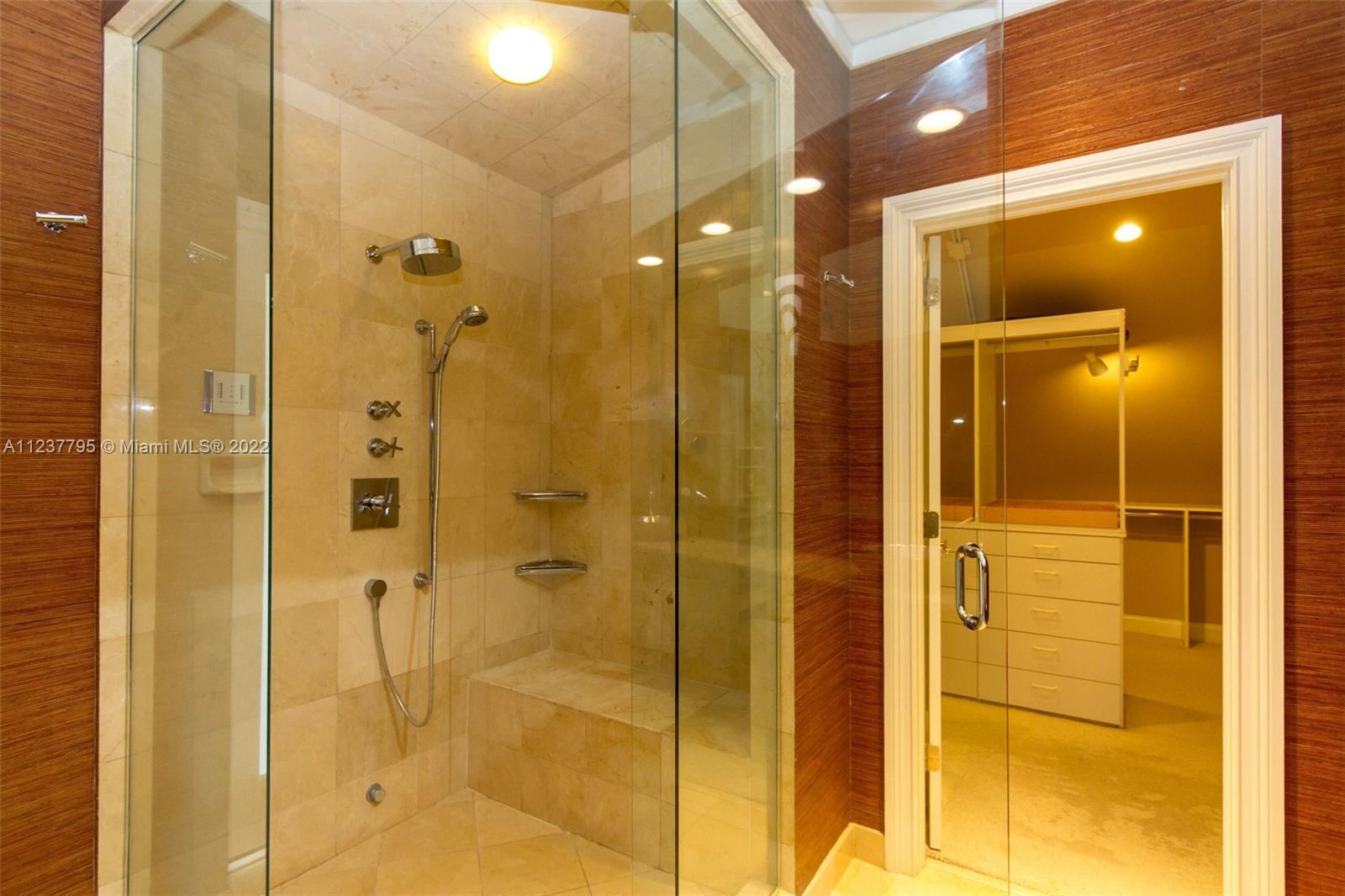 888 Brickell Key Drive, Unit PH2802 Miami, FL 33131 - Photo 39 of 47 a bathroom with a shower and a glass door