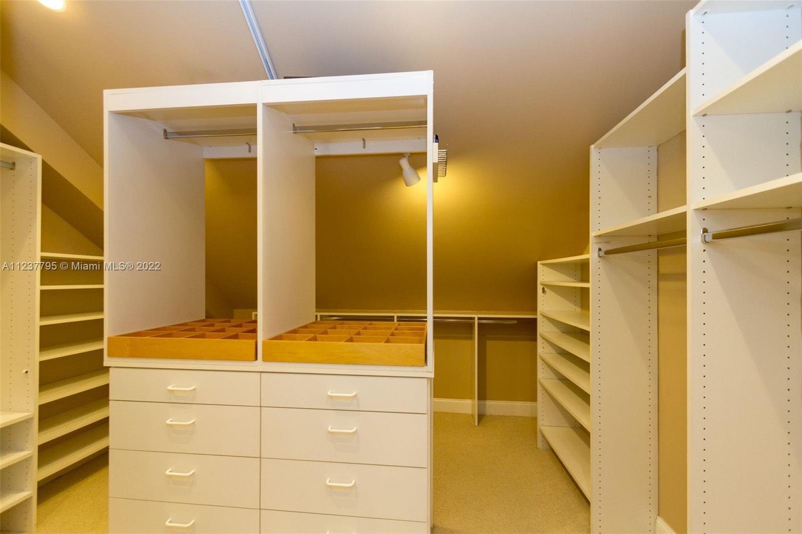 888 Brickell Key Drive, Unit PH2802 Miami, FL 33131 - Photo 42 of 47 a view of walk in closet