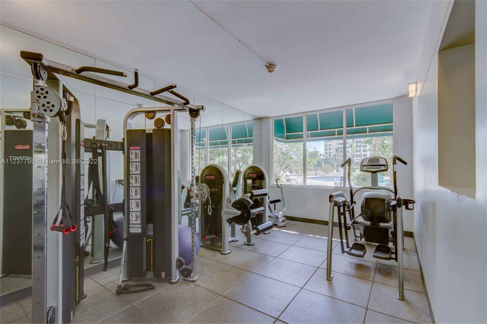 888 Brickell Key Drive, Unit PH2802 Miami, FL 33131 - Photo 44 of 47 a view of a room with gym equipment