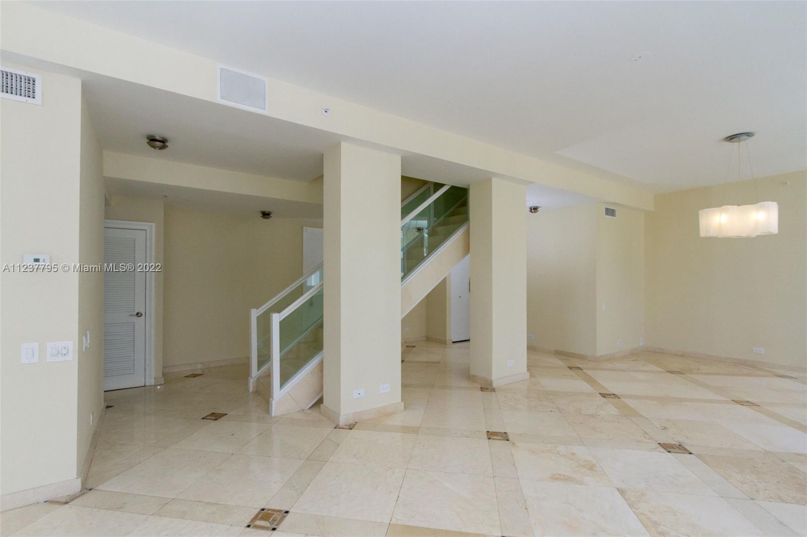 888 Brickell Key Drive, Unit PH2802 Miami, FL 33131 - Photo 5 of 47 a view of an empty room