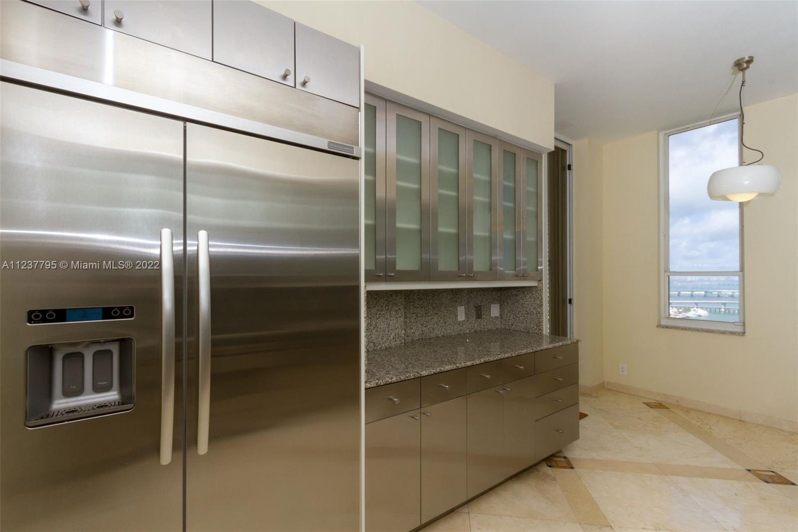 888 Brickell Key Drive, Unit PH2802 Miami, FL 33131 - Photo 6 of 47 a bathroom with a glass shower door