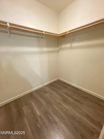 a view of an empty walk in closet