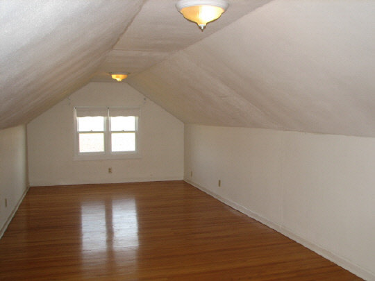 3279 Roscoe Road Rockton, IL 61072 - Photo 3 of 6 a view of a room with wooden floor and white walls