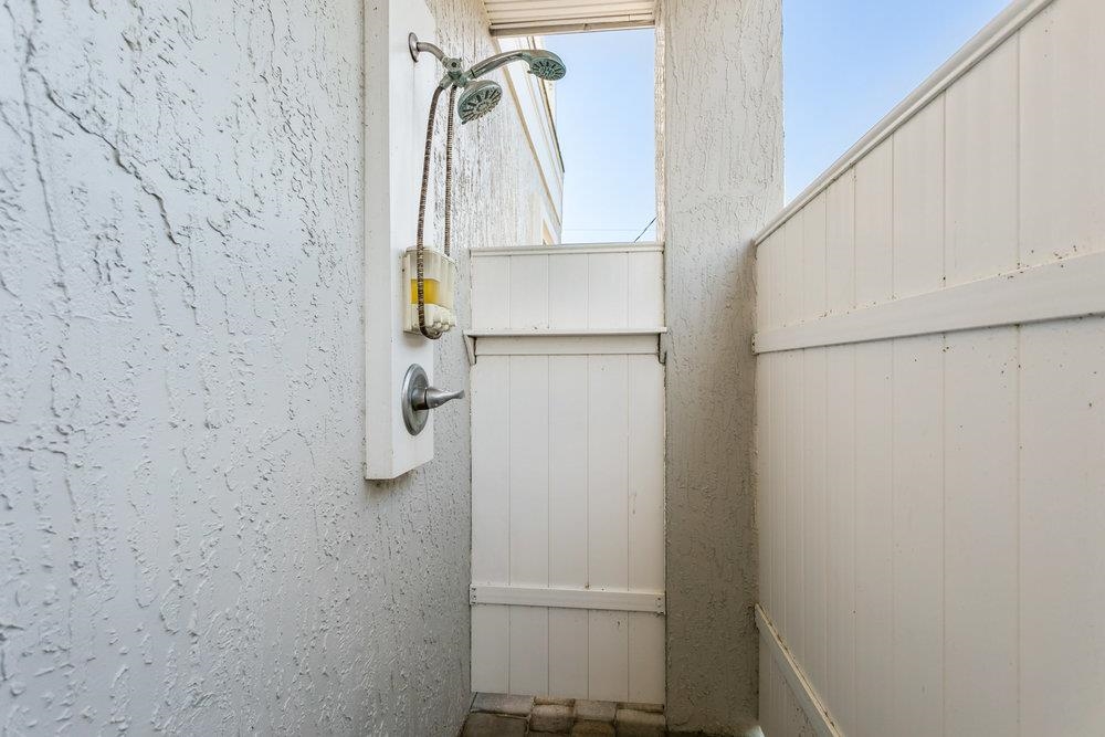 5467 Atlantic View St. Augustine, FL 32080 - Photo 14 of 42 a bathroom with a shower