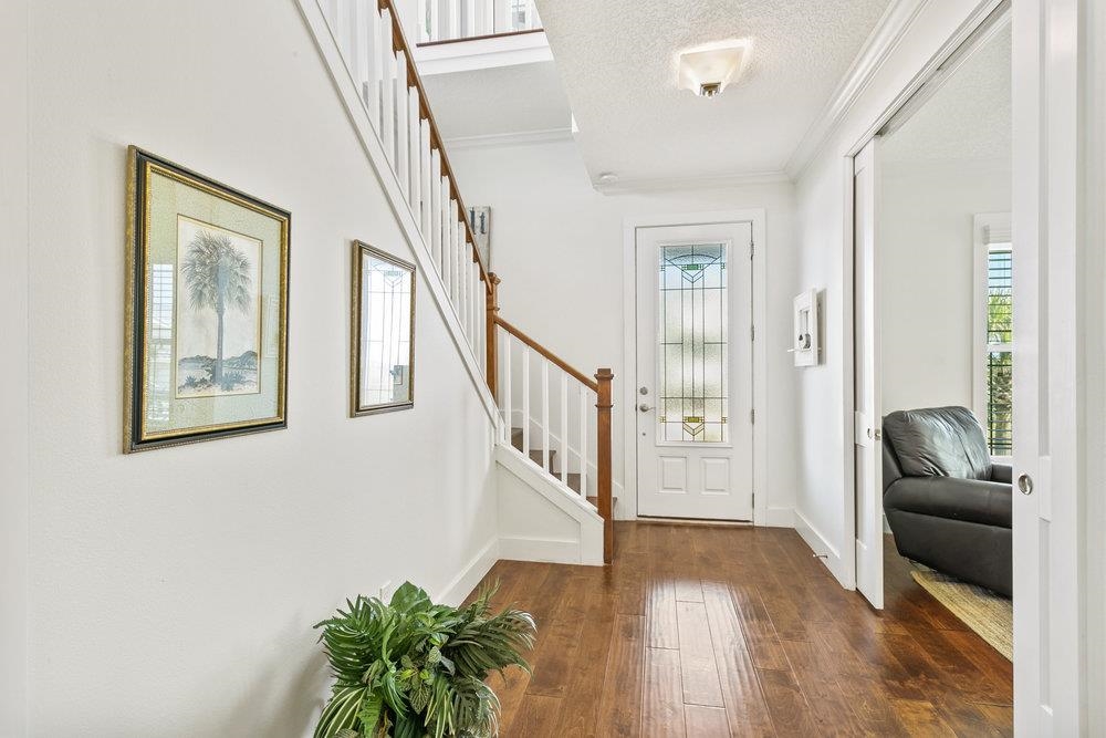 5467 Atlantic View St. Augustine, FL 32080 - Photo 15 of 42 a view of entryway and hall with wooden floor