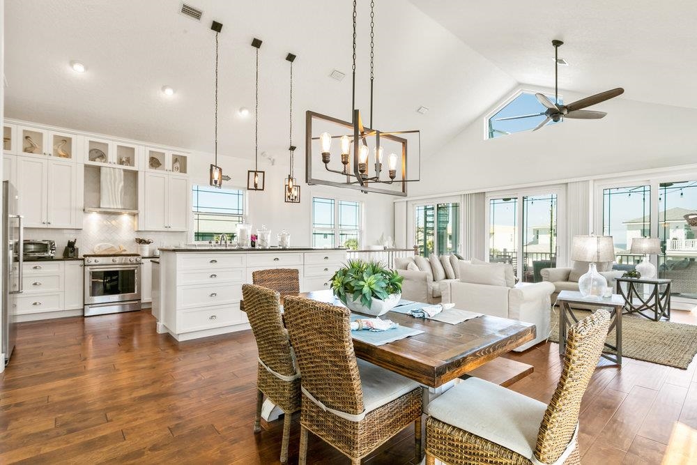 5467 Atlantic View St. Augustine, FL 32080 - Photo 22 of 42 a living room with lots of furniture and kitchen view