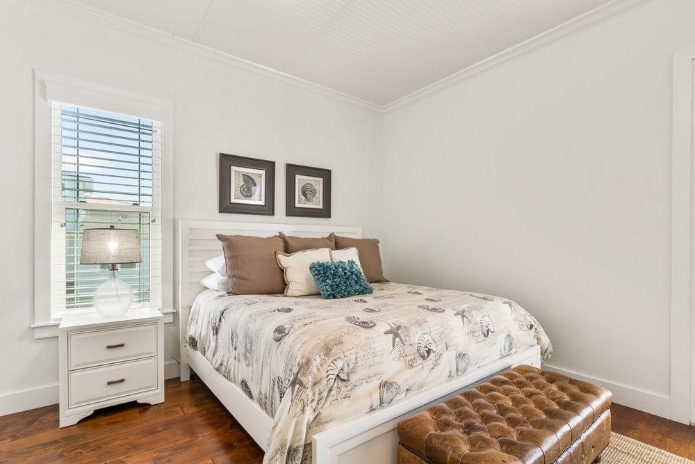 5467 Atlantic View St. Augustine, FL 32080 - Photo 29 of 42 a bedroom with a bed and a window