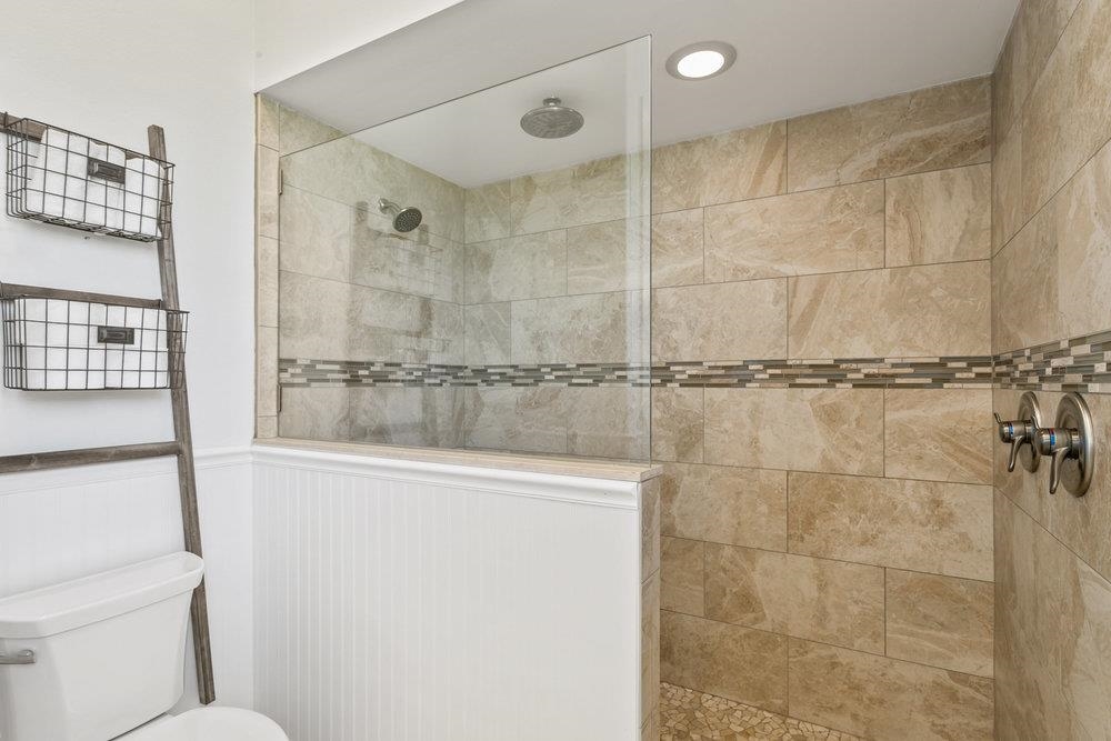 5467 Atlantic View St. Augustine, FL 32080 - Photo 31 of 42 a bathroom with a shower and a toilet