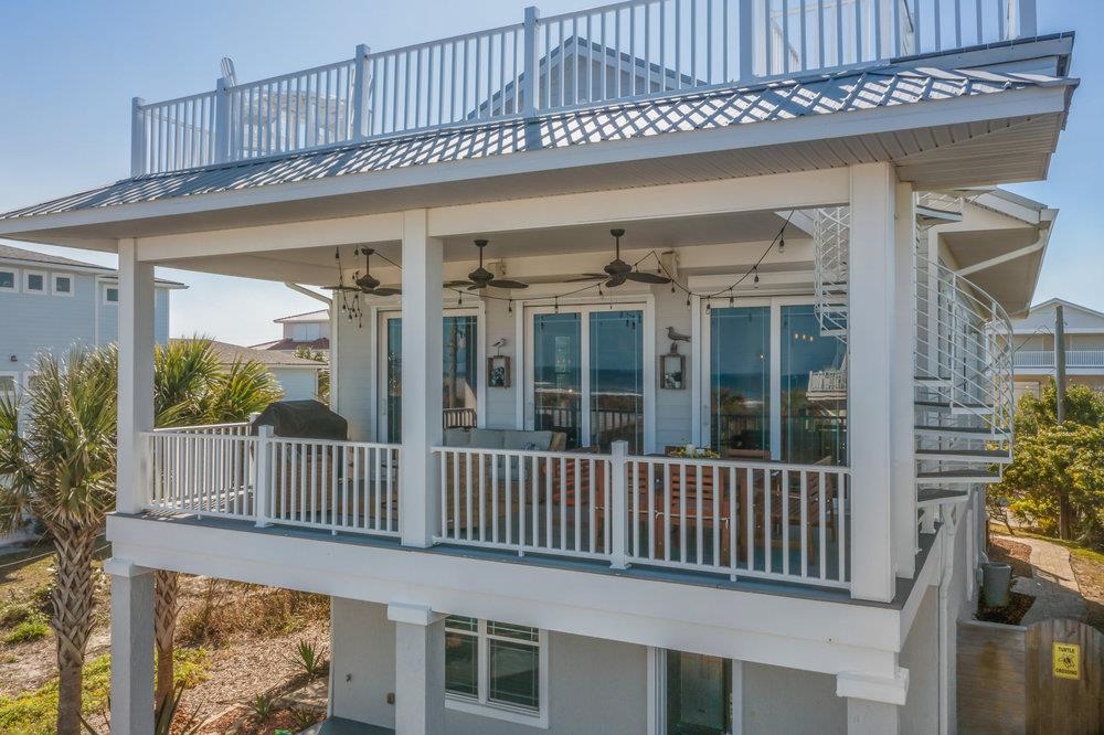 5467 Atlantic View St. Augustine, FL 32080 - Photo 41 of 42 front view of a house with a porch