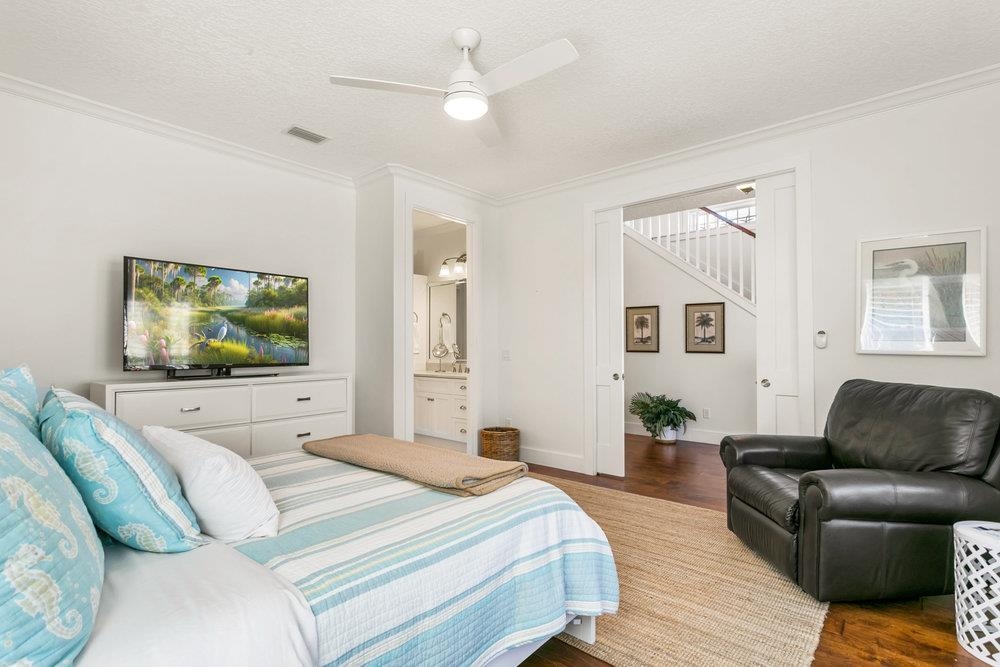 5467 Atlantic View St. Augustine, FL 32080 - Photo 6 of 42 a bedroom with a bed and a couch