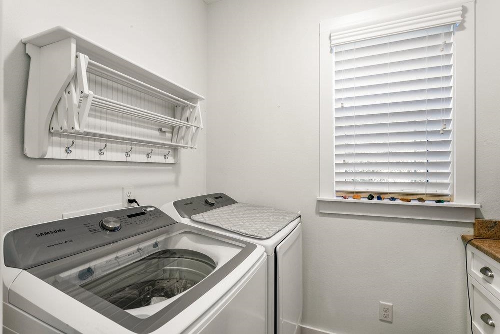 5467 Atlantic View St. Augustine, FL 32080 - Photo 9 of 42 a utility room with dryer and washer