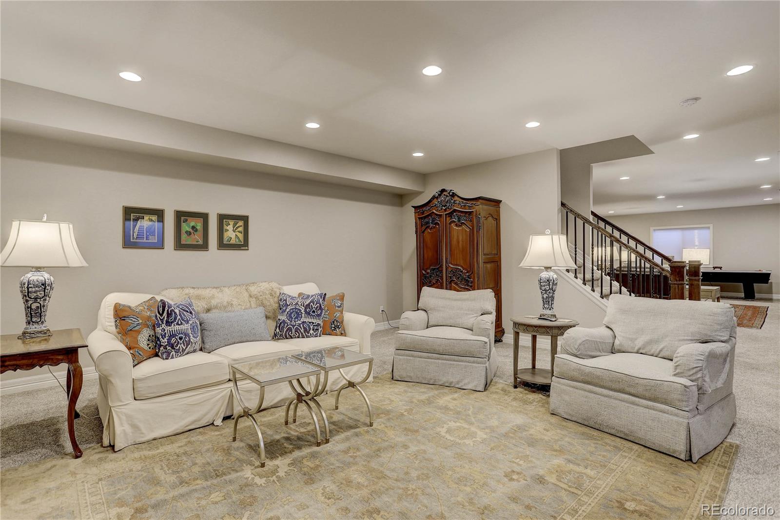 4907 Hogback Ridge Road Morrison, CO 80465 - Photo 35 of 47 a living room with furniture and a couch