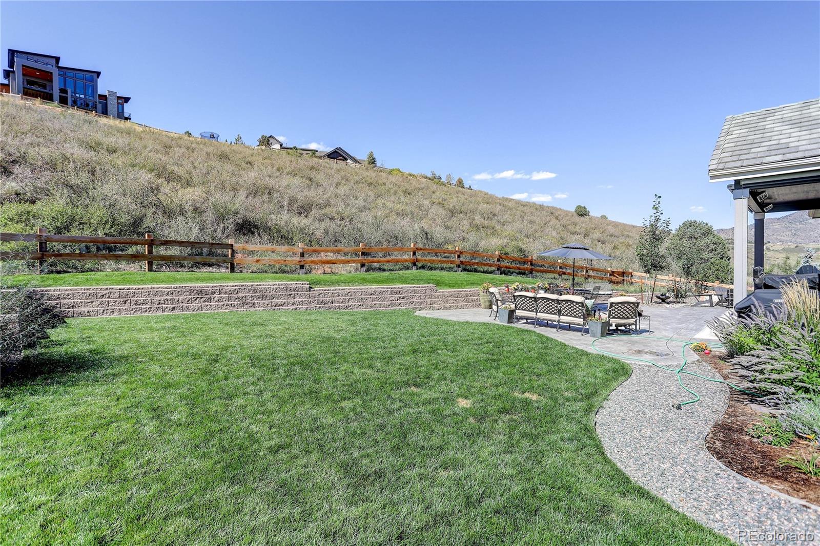 4907 Hogback Ridge Road Morrison, CO 80465 - Photo 47 of 47 a view of a park with large trees