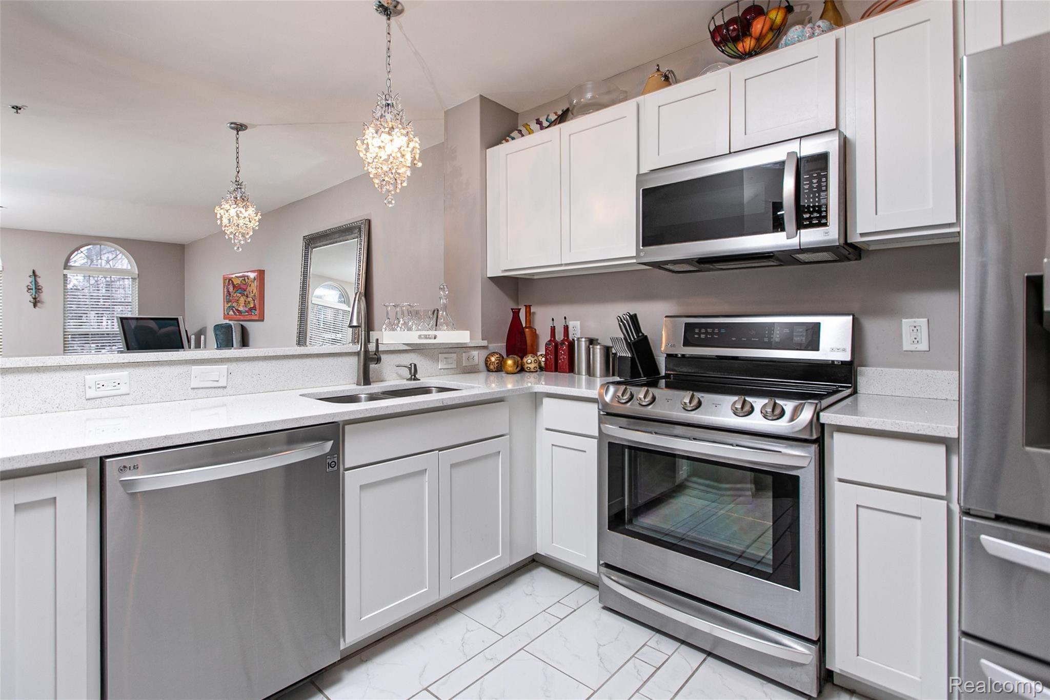 20051 Rodeo Court Southfield, MI 48075 - Photo 7 of 20 Fully updated kitchen including white cabinets.
