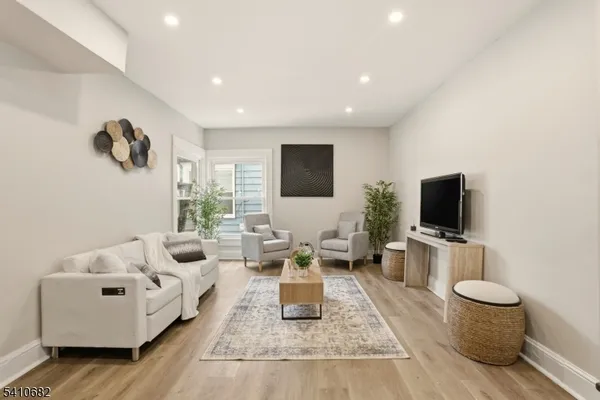 a view of a living room and dining room