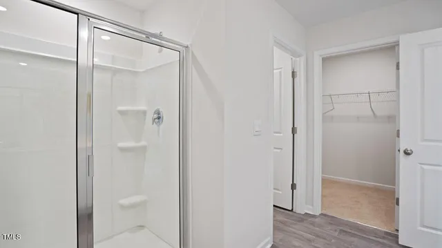 a view of a room with racks on the wall